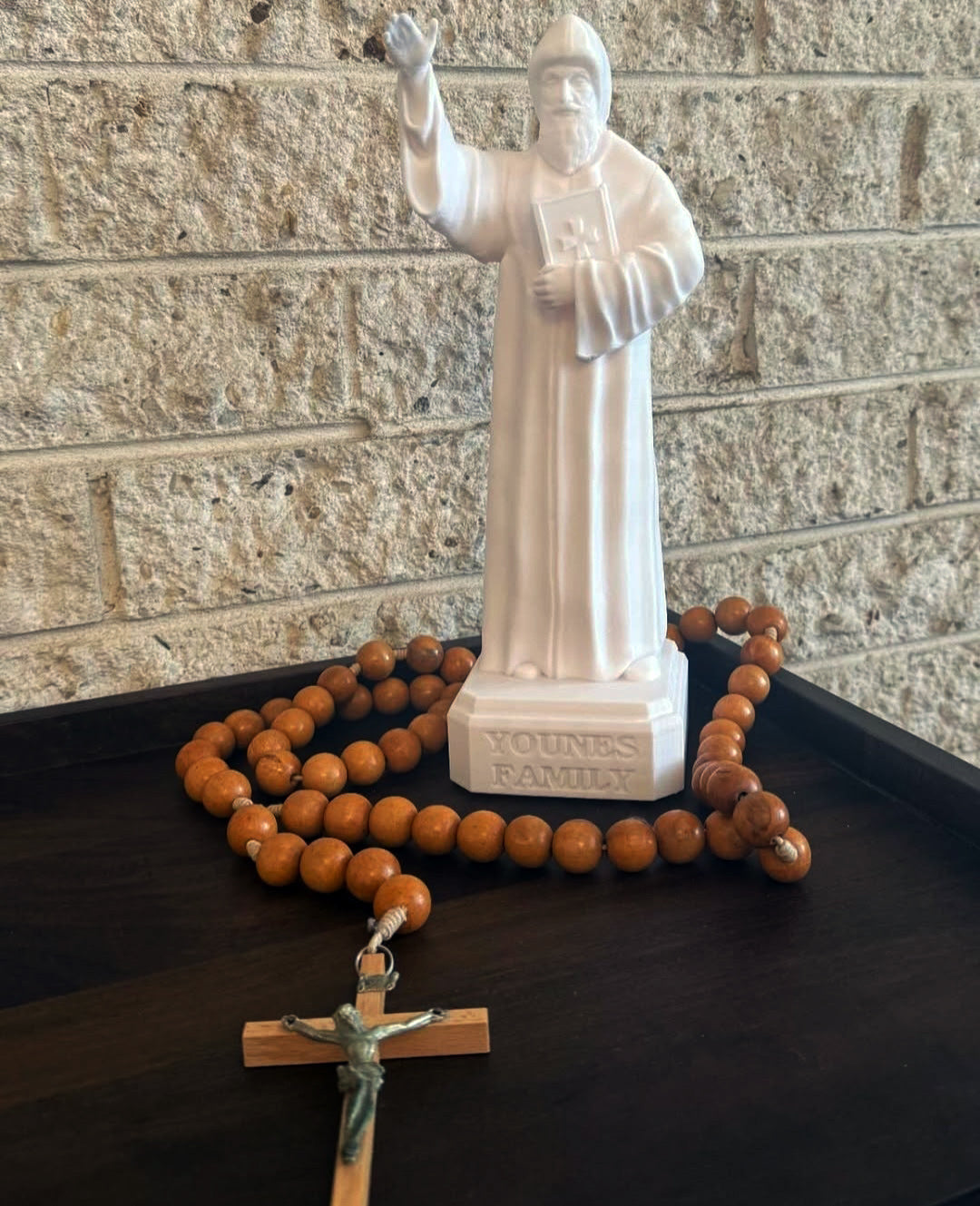 Saint Charbel statue with intricate 3D-printed details in an elegant pose.