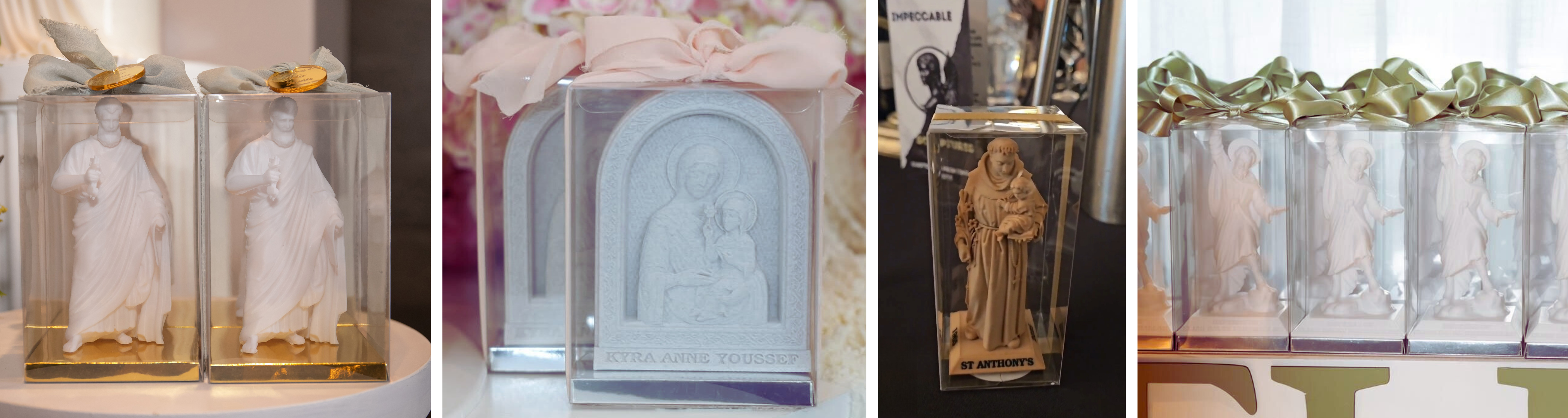 Religious bonbonniere gifts with saint figurines in transparent gift boxes