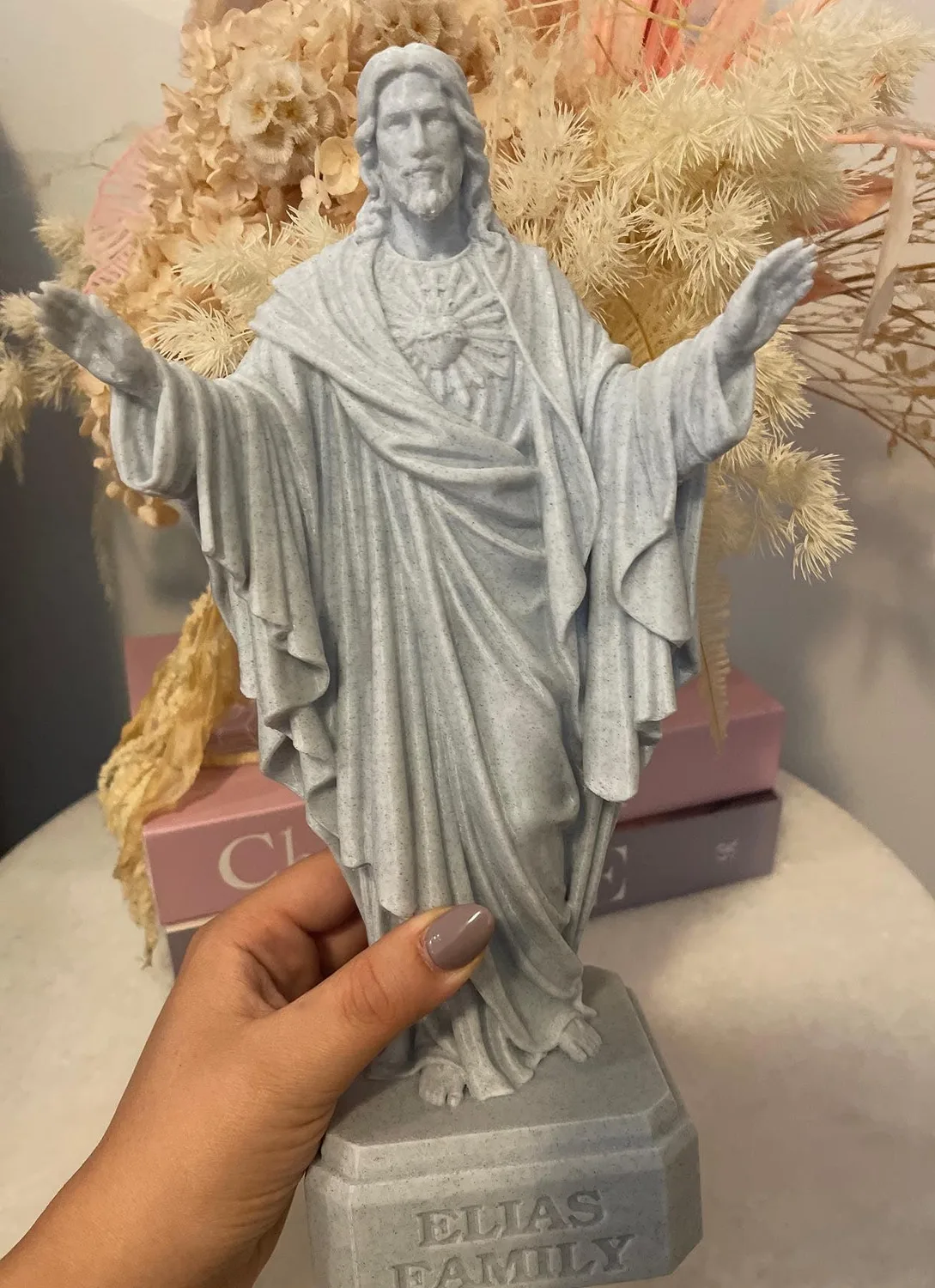 Jesus Christ “Sacred Heart” statue with arms outstretched