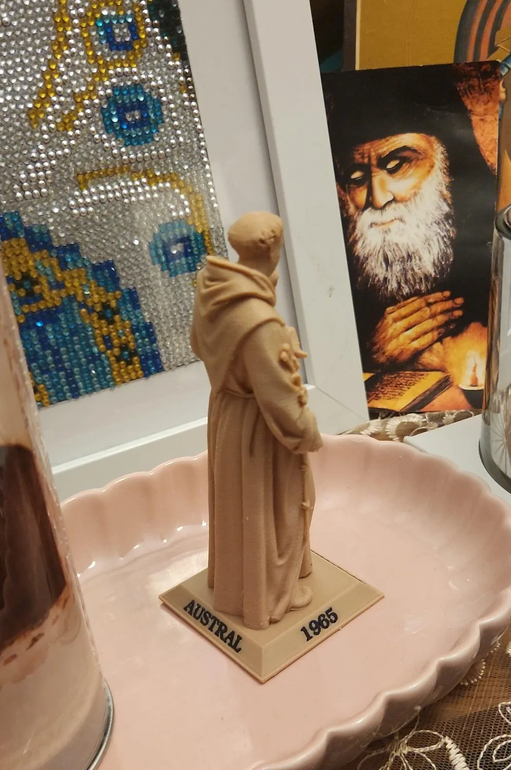 Saint Anthony of Padua statues in four finishes, each on an inscribed base