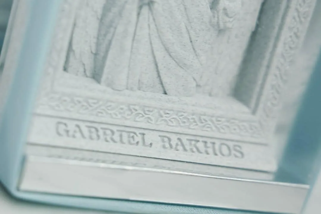 Close-up of personalised lettering on a Saint Gabriel icon base